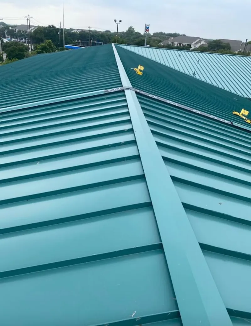 Green commercial metal roof ridge and valley for Metal Roof Repair in El Cerrito