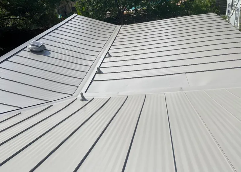 Solar attic fan installed on a metal roof for Roof Ventilation in El Cerrito